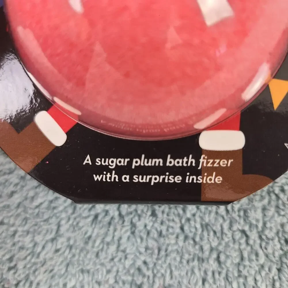 Da Bomb Bath Fizzer Red Santa bomb Sugar Plum Scent Soft on Skin Surprise Inside